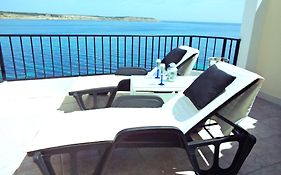 Seafront Apartment Terrace, Lounger & Panoramic Ocean Views